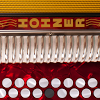 com.tradlessons.hohner.tablet.melodeon.bc